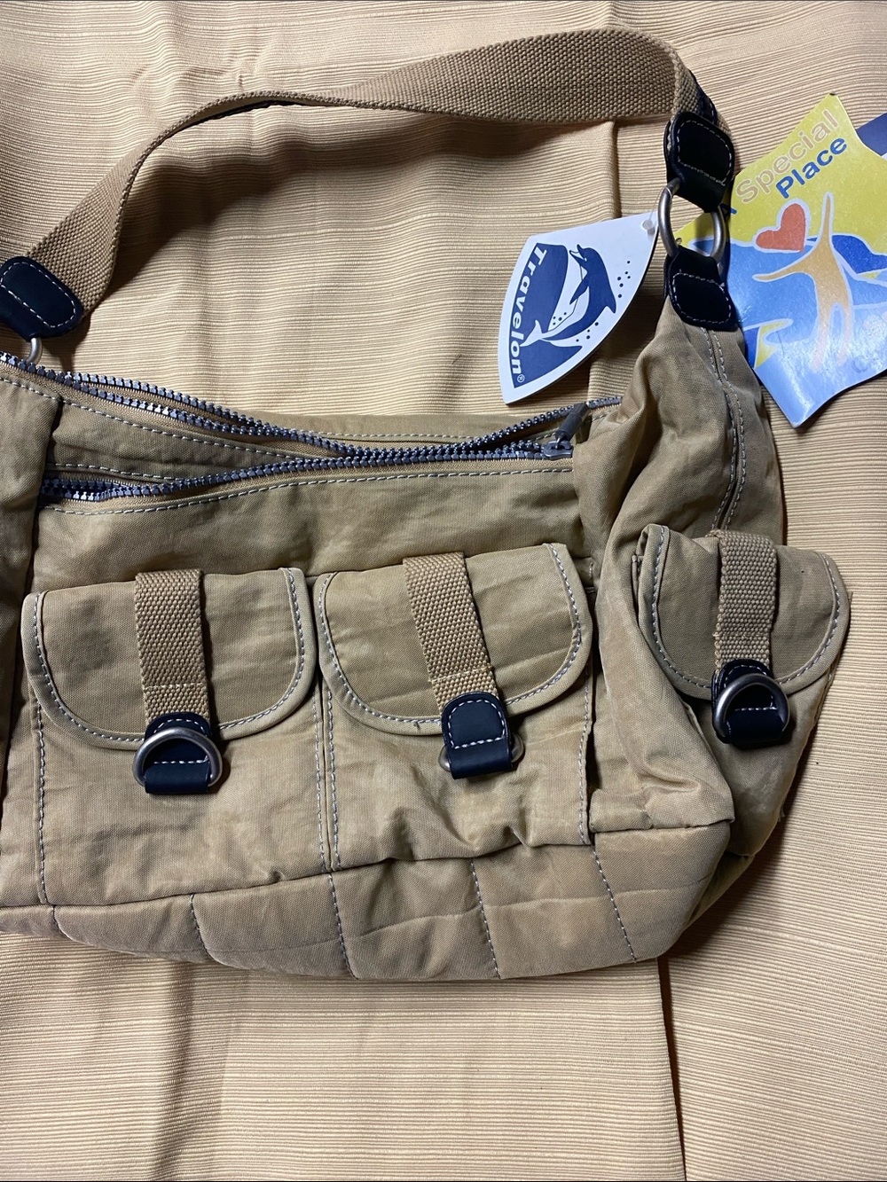 Canvas Multi-Pocket Crossbody Bag in Tan